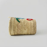 Woven Straw Market Tote Bag with Embroidered Winking Face Design